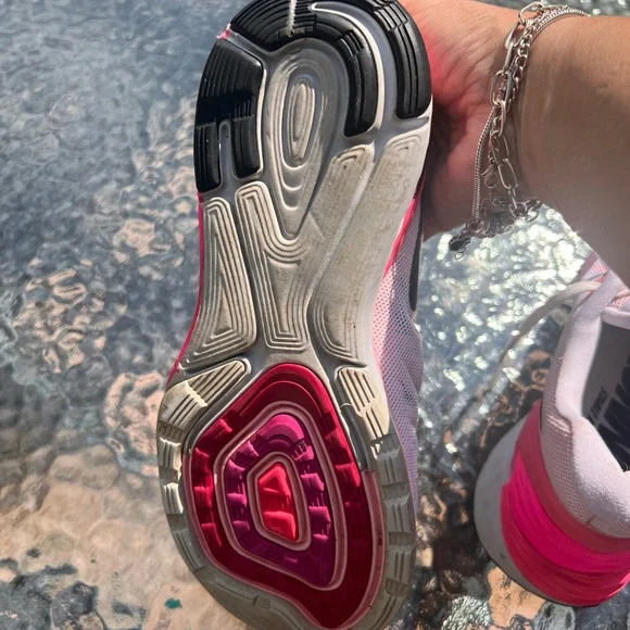 Nike Women's Pink, White and Black athletic sneakers. - Picture 16 of 17
